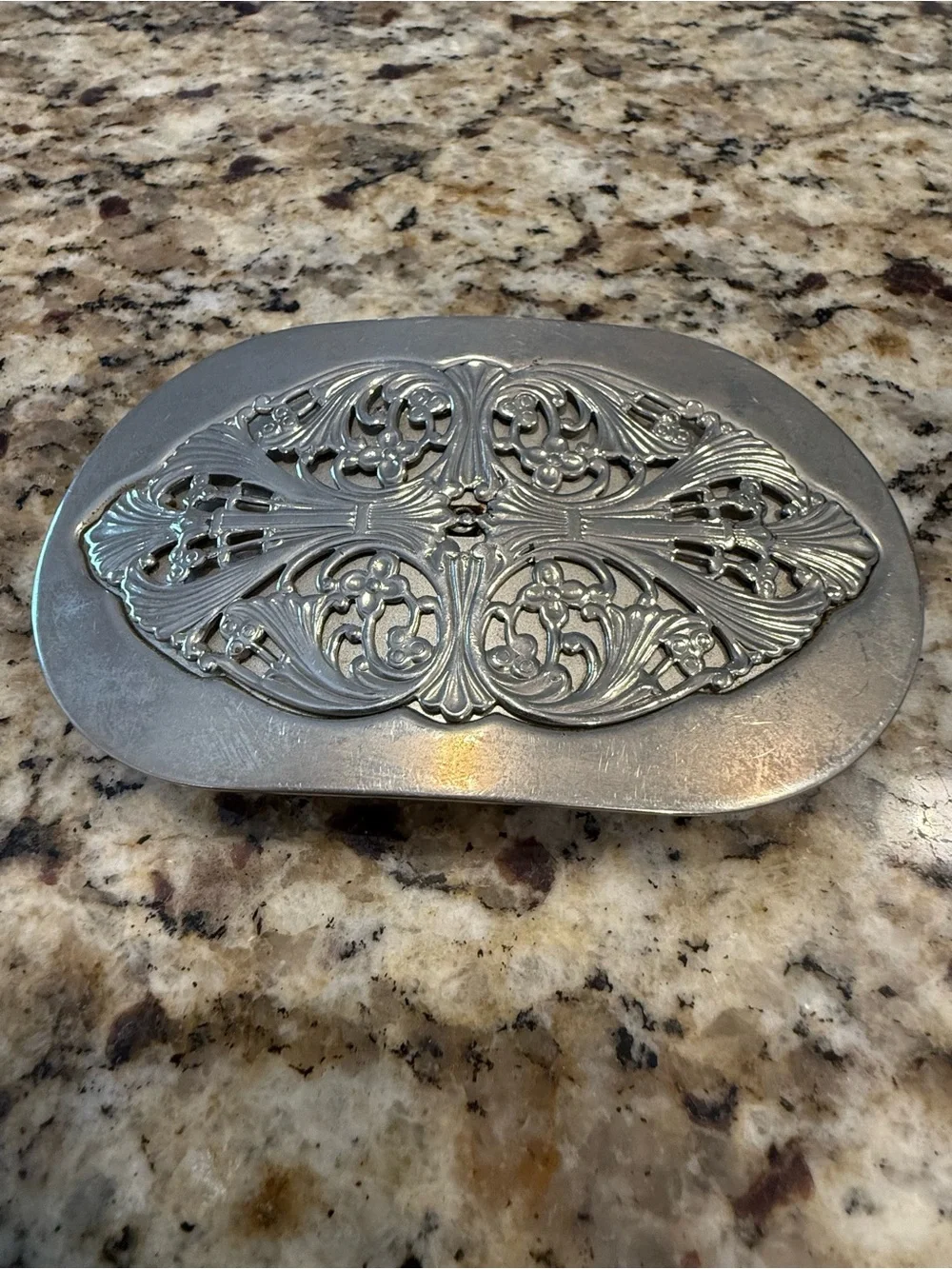 Western silver tone ornate floral scrolled belt buckle